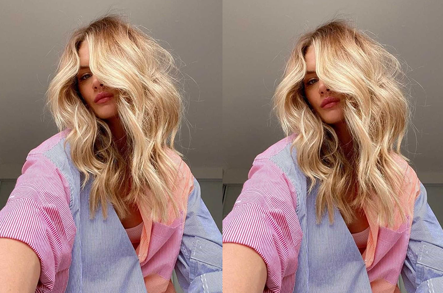 woman wearing halo hair extensions with dry scalp or dandruff. wondering if dry scalp versus dandruff are different