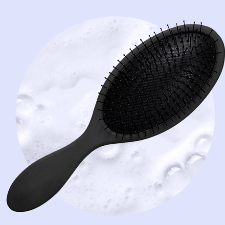 a brush that has been cleaned. people often wonder how to clean your hair brushes in order to get a brush this clean.