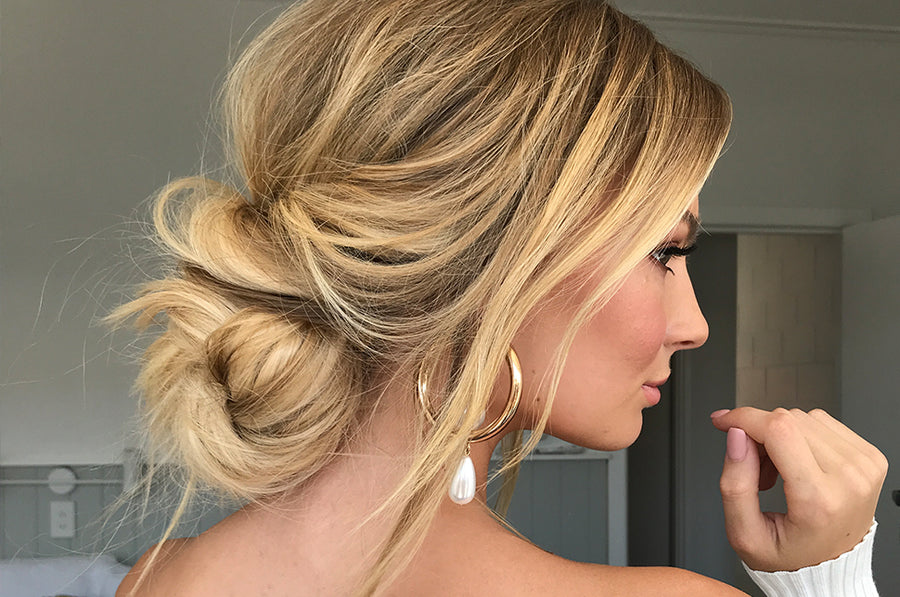 The 2-Minute Hack To Elevate Your Messy Bun girl donning beige blonde + derk blonde 613/10 halo hair extensions