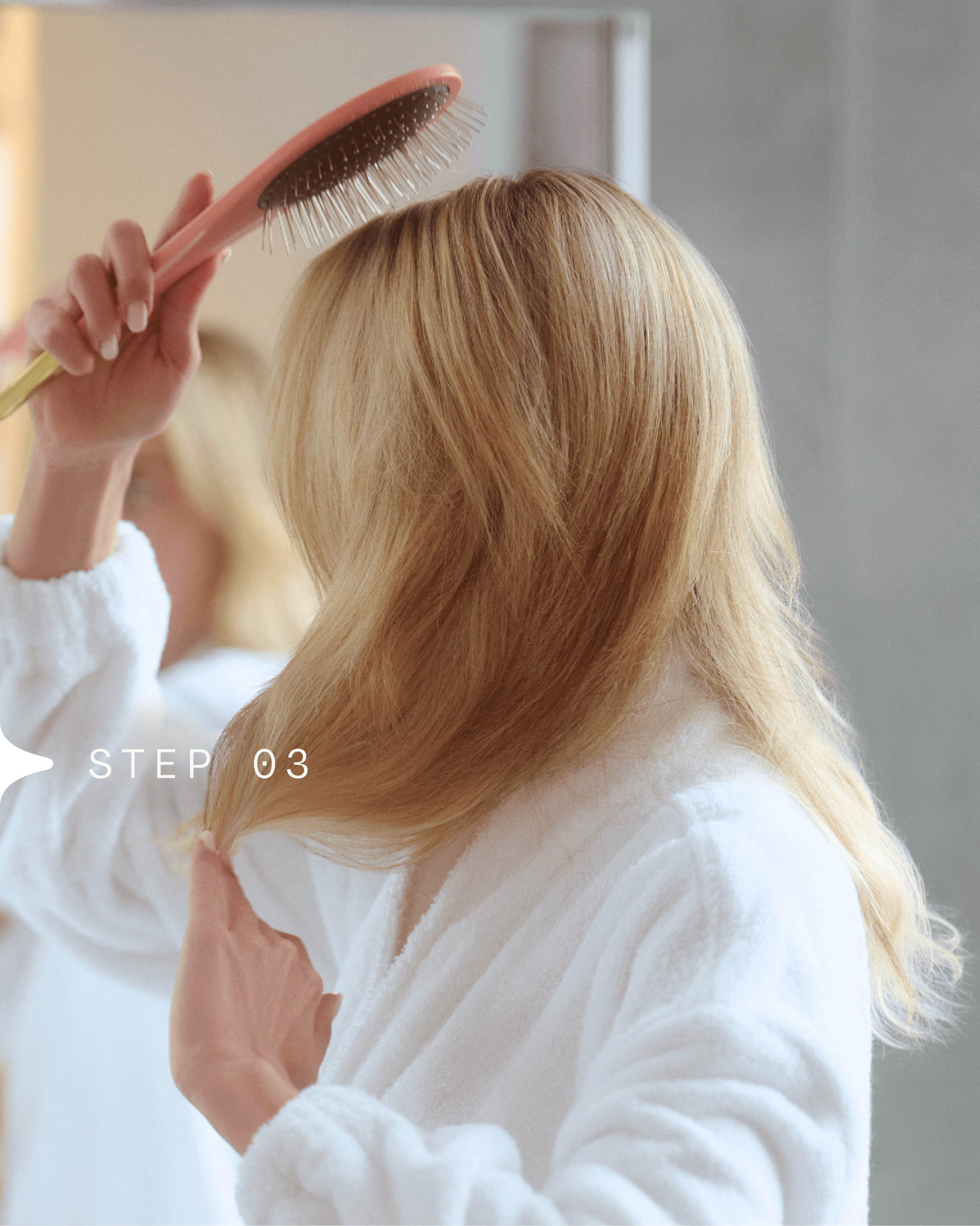 Halo Install Step 3: A woman brushes out her halo hair extension to blend with her natural hair