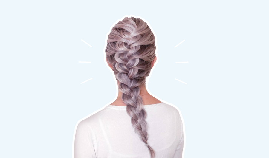 Photo of back of woman's head with mermaid braid hairstyle. Blue background with white stroke.