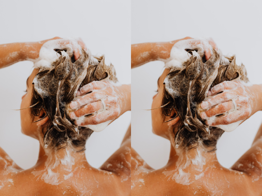 Alt Text: Back view of a woman in the shower. Caption: Experience the effects of hard water firsthand.