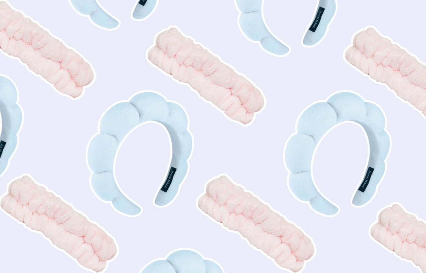flat lay of spa headbands; alternating pink and blue headbands used for spa beauty routines
