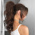 Halo hair extensions in a ponytail
