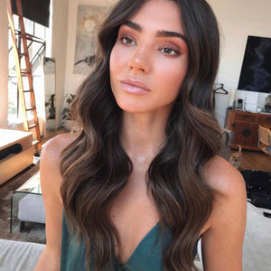 Dani pulls off thick halo extensions in medium brown