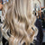 Halo hair extensions from behind by PinklaBlonde