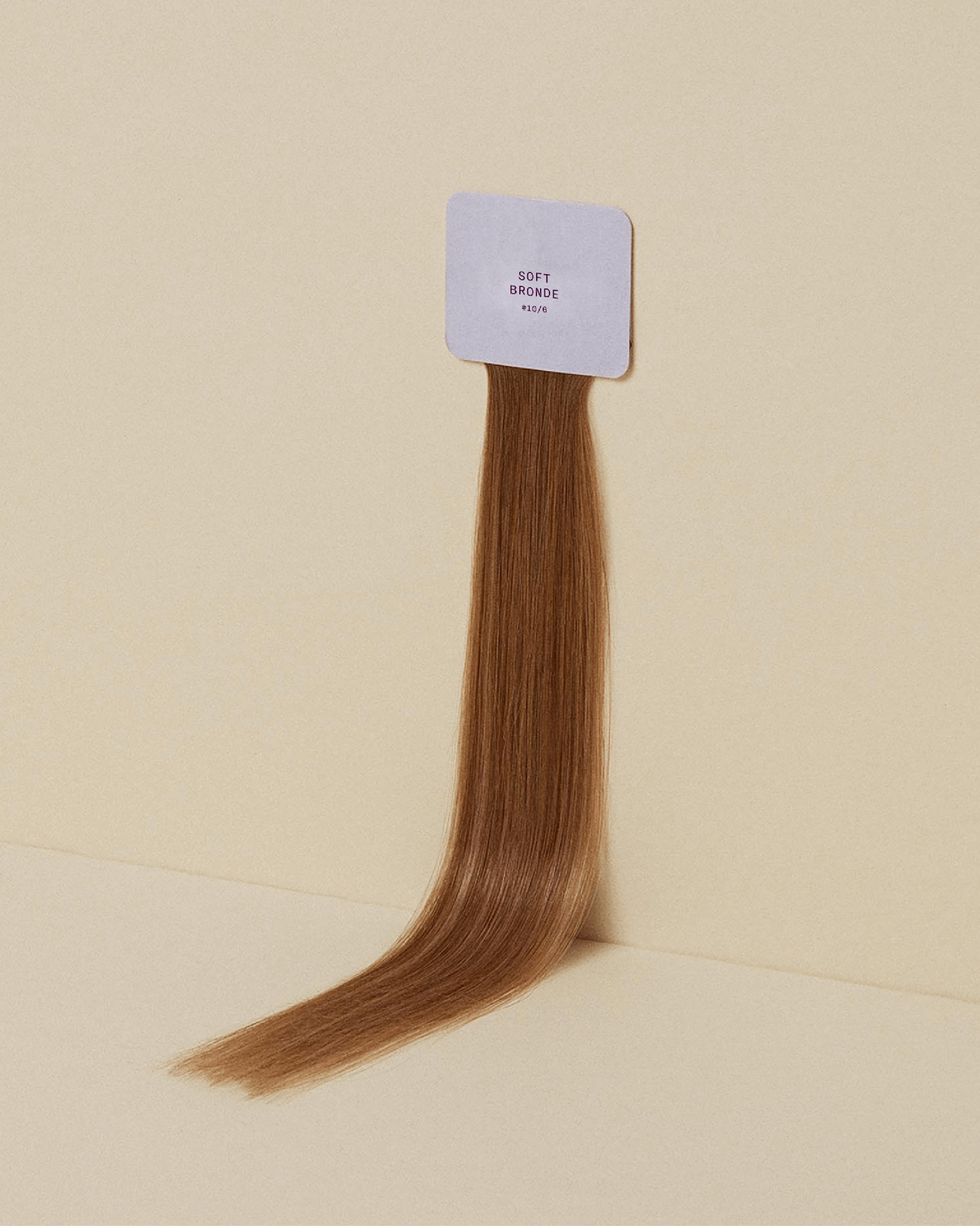 A soft bronde halo hair extension color swatch